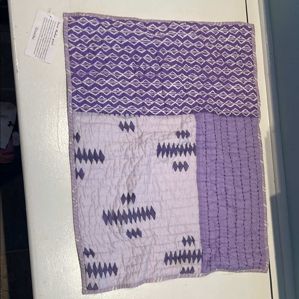 Purple and White Quilted Blanket